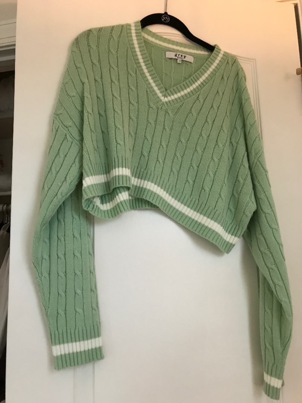 Grey Bandit pale green, v necked sweater